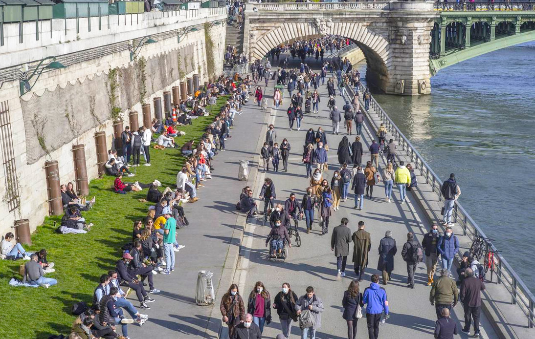 Parisians Crowd Streets and Parks Despite New COVID-19 Restrictions