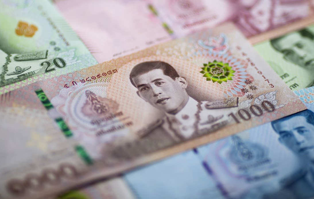 Baht Falls Against the Dollar, Trading Below 37